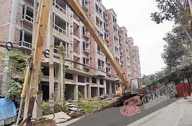 北碚一幢7层高商品房 伪造规划许可证销售获利